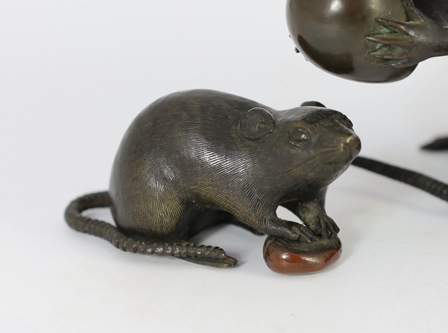 An assembled group of five Japanese bronze and mixed metal models of rats, Meiji period, smallest 9.5cm long, largest 16.5cm long, one small rat tail detached